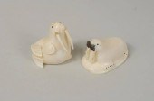TWO INUIT WALRUS IVORY CARVING