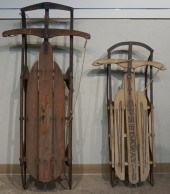 TWO IRON AND WOOD SNOW SLEDSTw