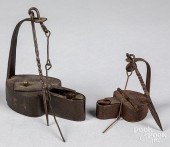 TWO IRON BETTY LAMPS, 19TH C.T