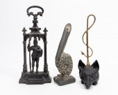 TWO IRON DOORSTOPS & MIXED STO