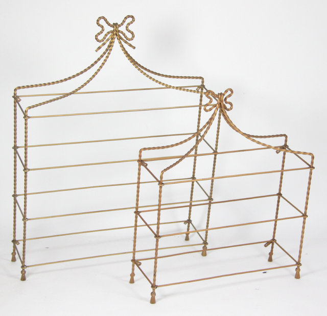 Two iron framed hanging wall