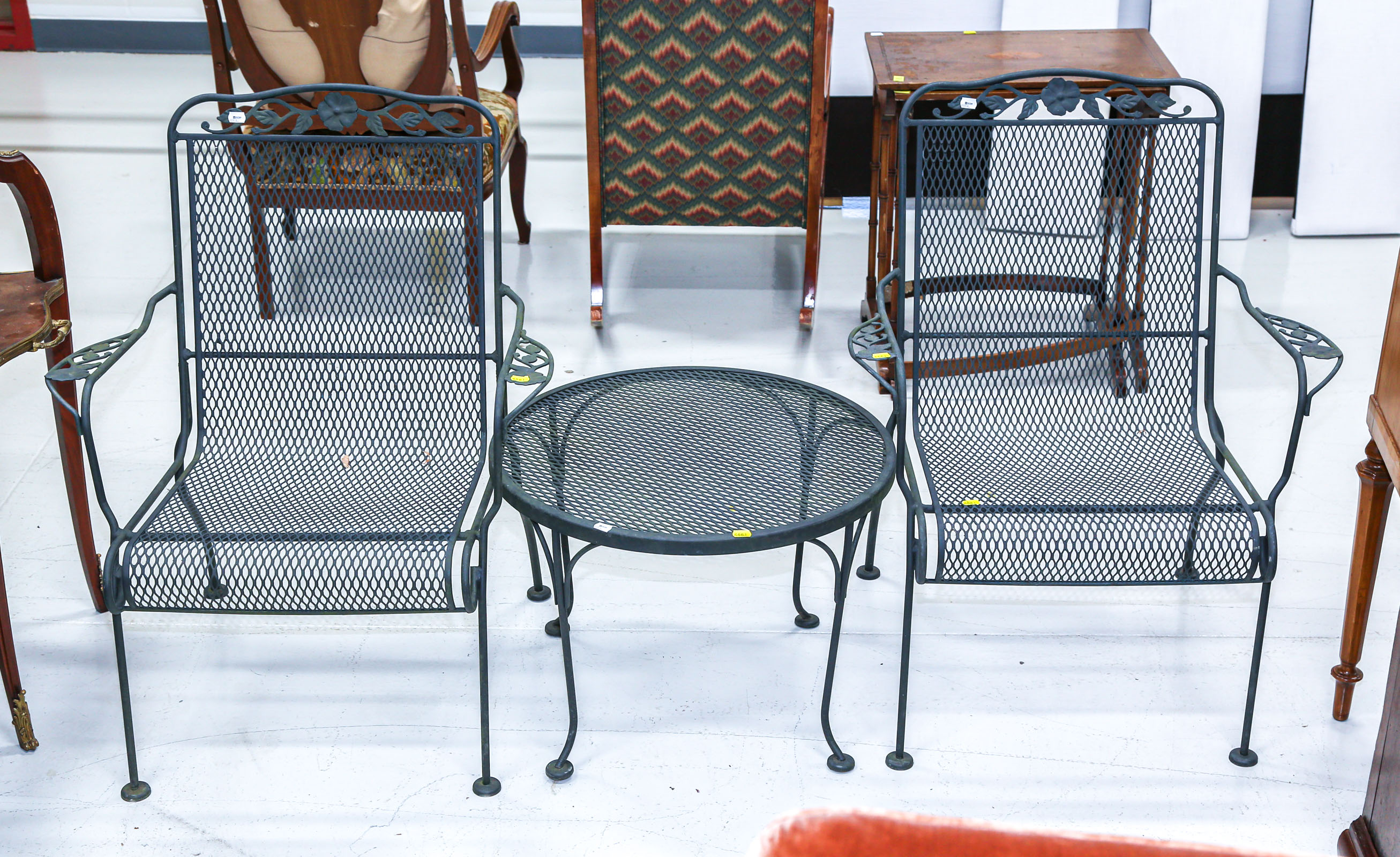 TWO IRON PATIO CHAIRS & A