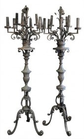 TWO IRON TORCHERES, EACH HAVIN