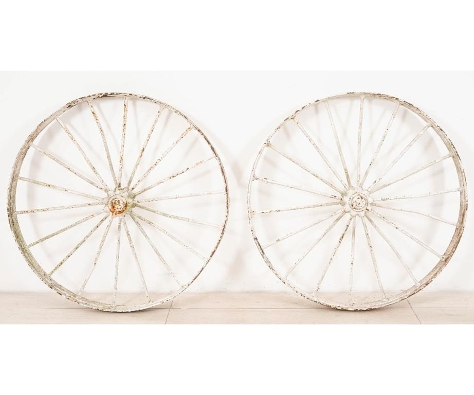 Two iron tractor wheels probably