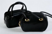 TWO ITALIAN BLACK LEATHER HAND