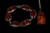 TWO ITEMS AMBER JEWELRY. Facet