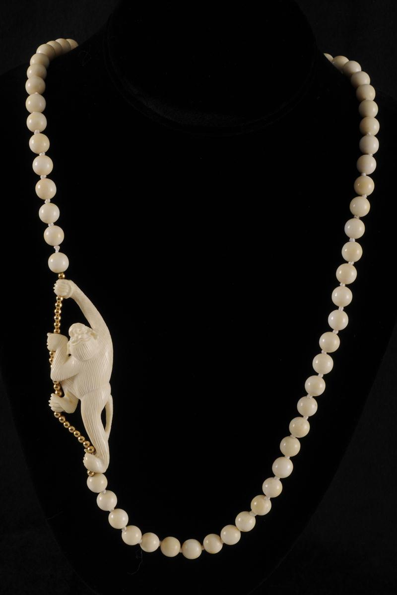 TWO IVORY BEADED NECKLACES Together
