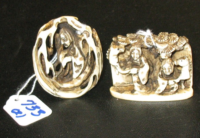 TWO IVORY CARVED NETSUKE: the first