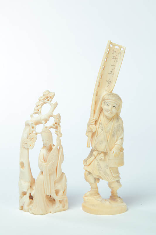 TWO IVORY FIGURAL CARVINGS. 
