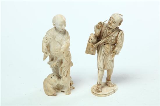 TWO IVORY FIGURES.  Japan  late