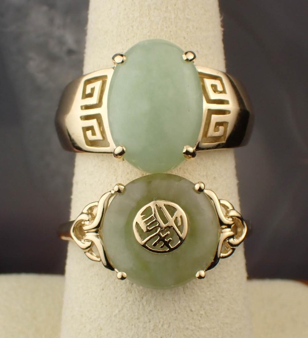 TWO JADE AND FOURTEEN KARAT GOLD