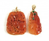 TWO JADE AND FOURTEEN KARAT GO
