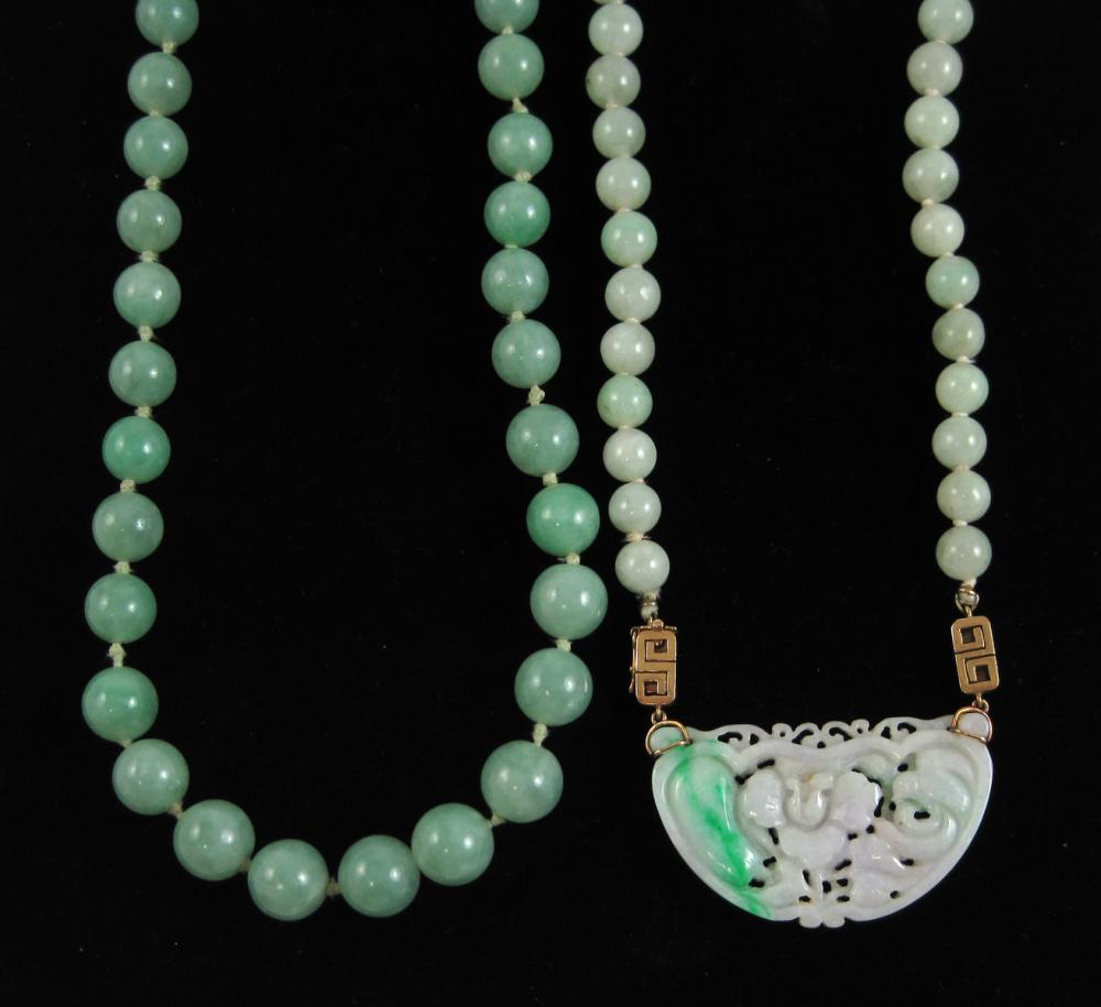 TWO JADE AND FOURTEEN KARAT GOLD