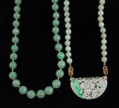 TWO JADE AND FOURTEEN KARAT GO