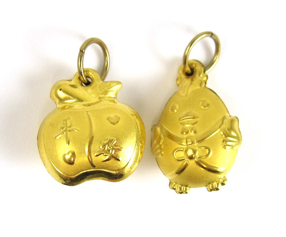 TWO JADE AND TWENTY-FOUR KARAT GOLD