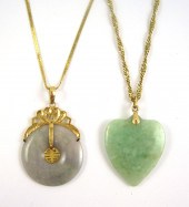 TWO JADE AND YELLOW GOLD PENDA