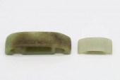 TWO JADE CARVED BELT HOOKSan a