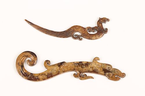 TWO JADE DRAGON PENDANTSA set of