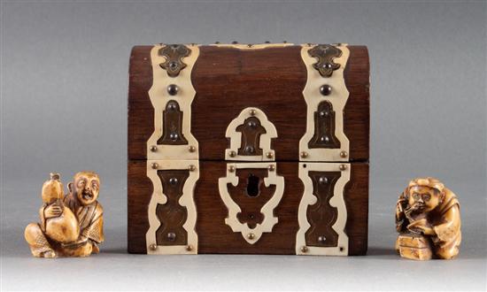 Two Japanese carved bone netsukes