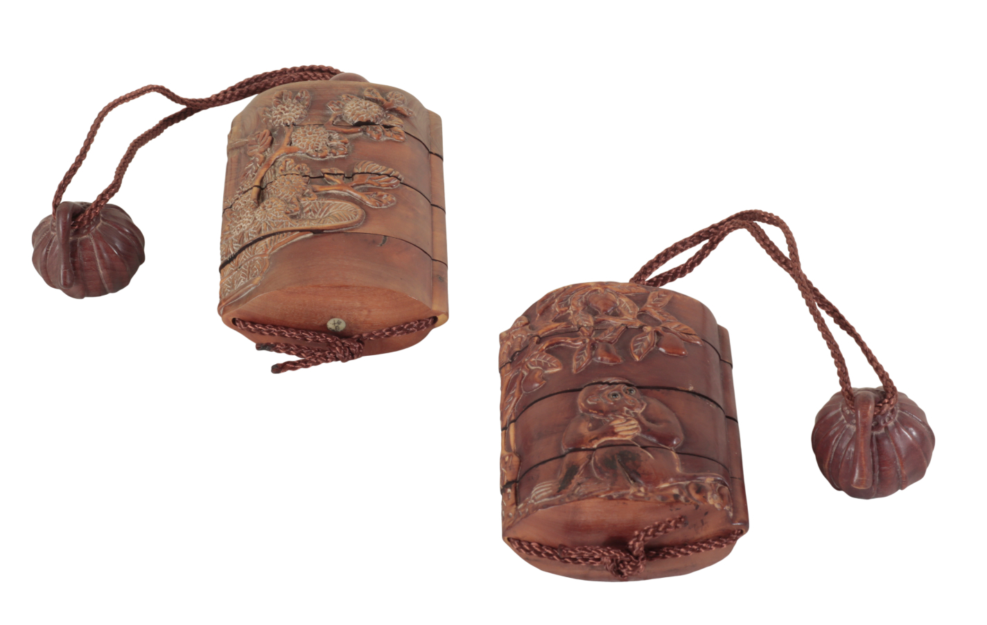TWO JAPANESE CARVED WOOD THREE-CASE