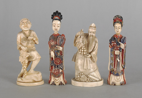 Two Japanese geisha form carved and