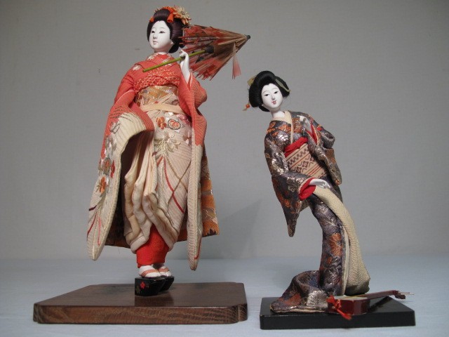 Two Japanese Kabuki dolls. One