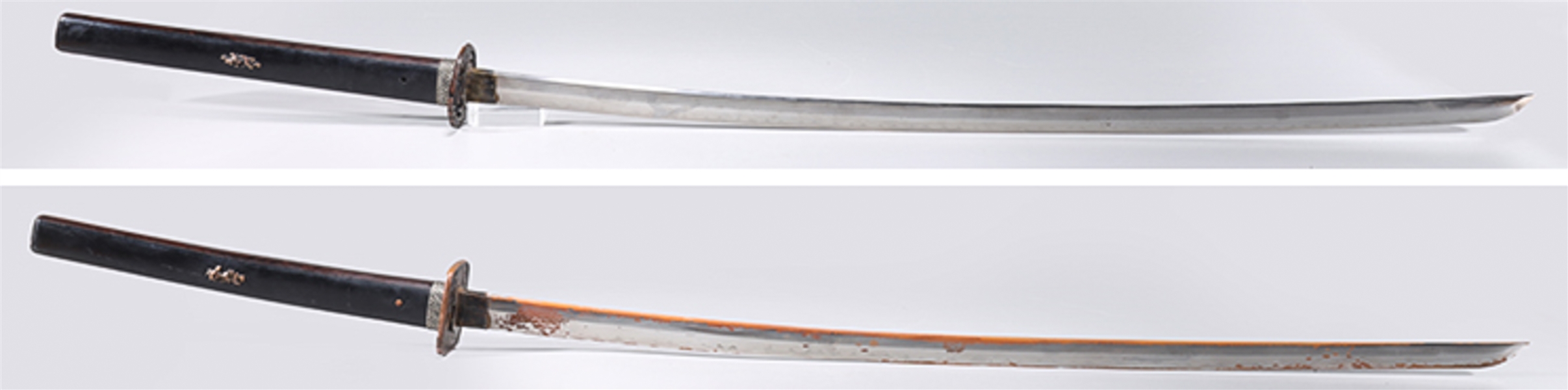 Two Japanese sheathed samurai