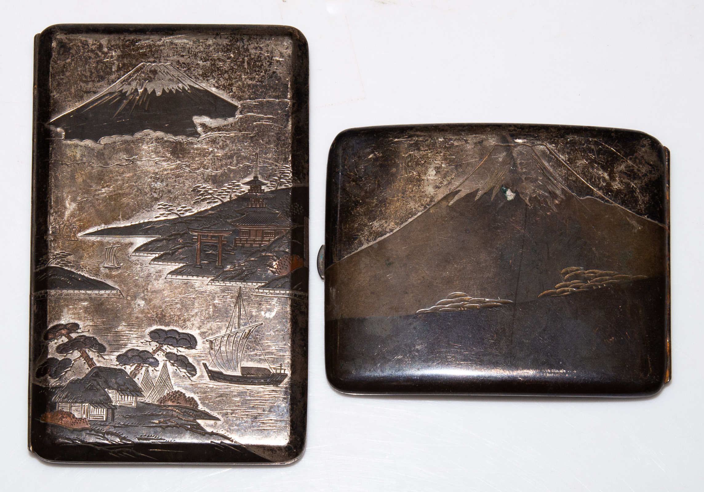 TWO JAPANESE STERLING CIGARETTE