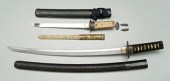 Two Japanese swords, letter op