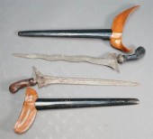 TWO JAVANESE KRIS KNIVES WITH