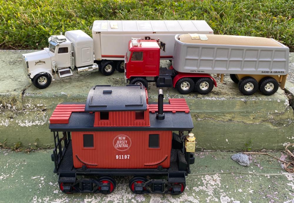 TWO JIM BEAM TRACTOR TRAILERS & A