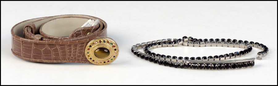 TWO JUDITH LEIBER BELTS.