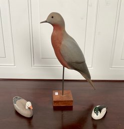 Two Ken Strickland signed carved
