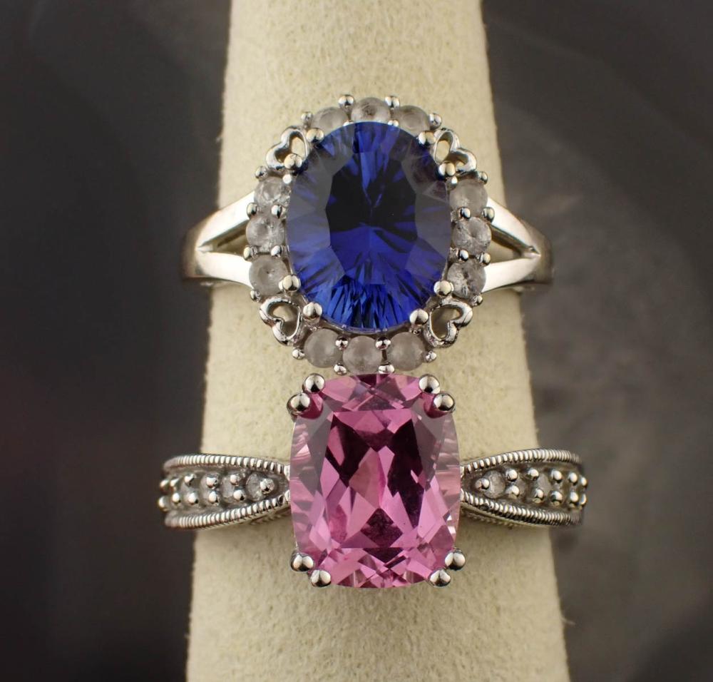 TWO LAB CREATED SAPPHIRE AND