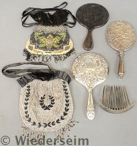 Two ladies change purses silver