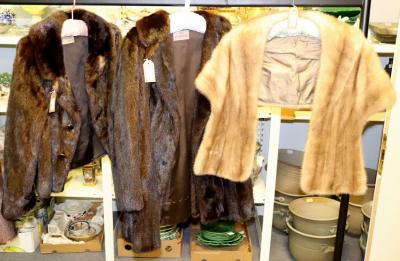 Two ladies fur coats, one