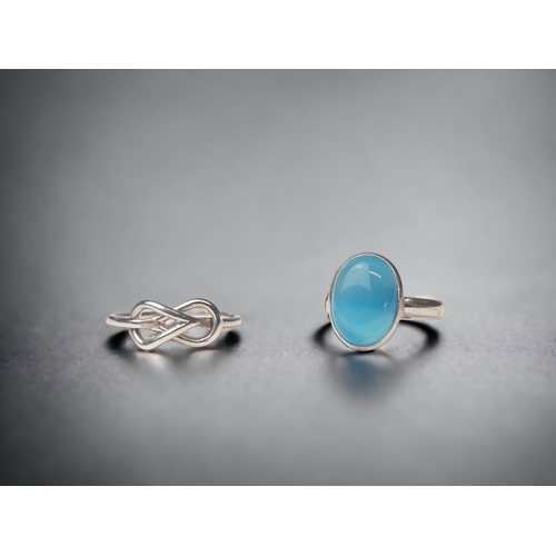 TWO LADIES STERLING SILVER RINGS.