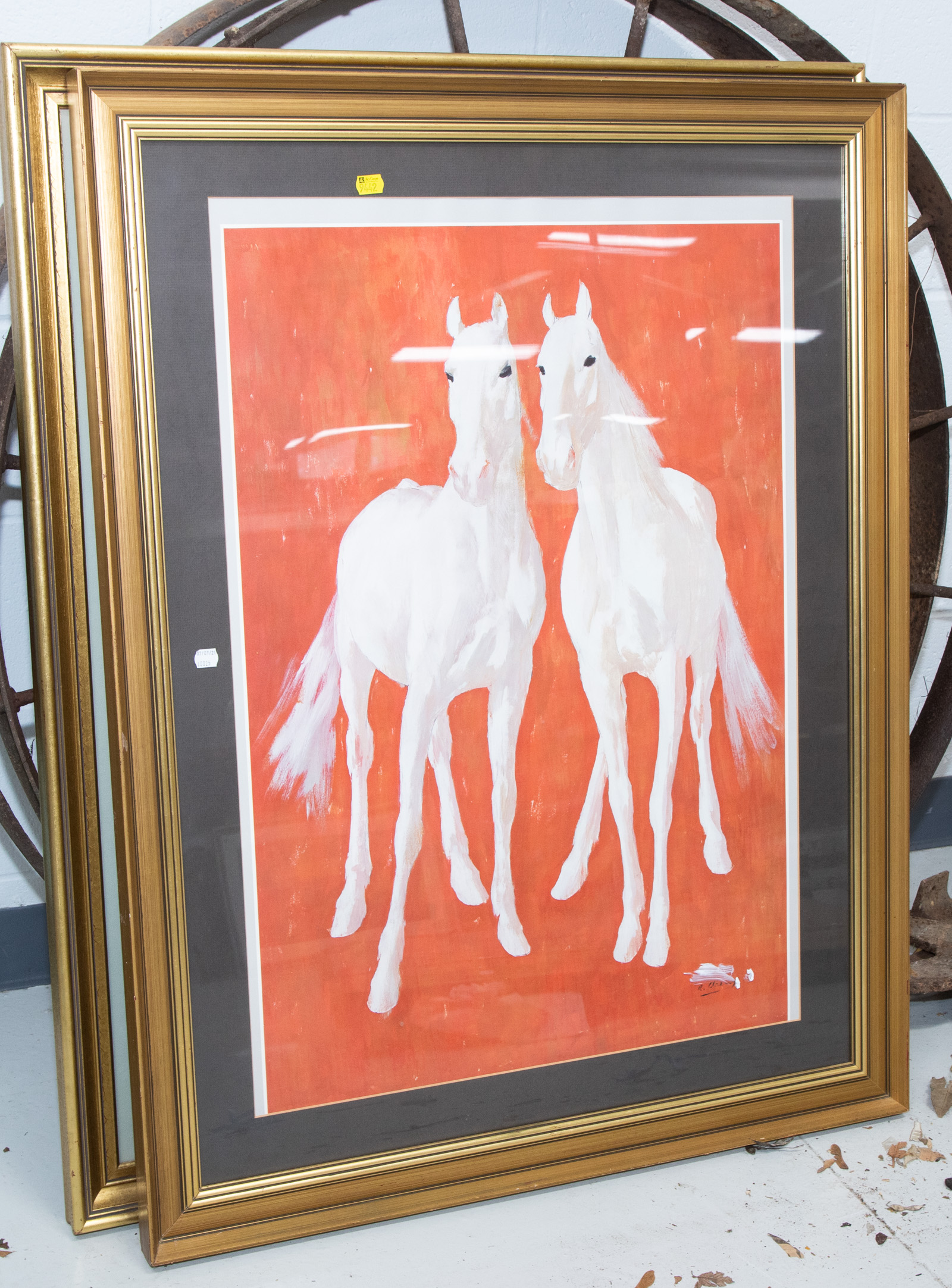TWO LARGE FRAMED HORSE PRINTS .