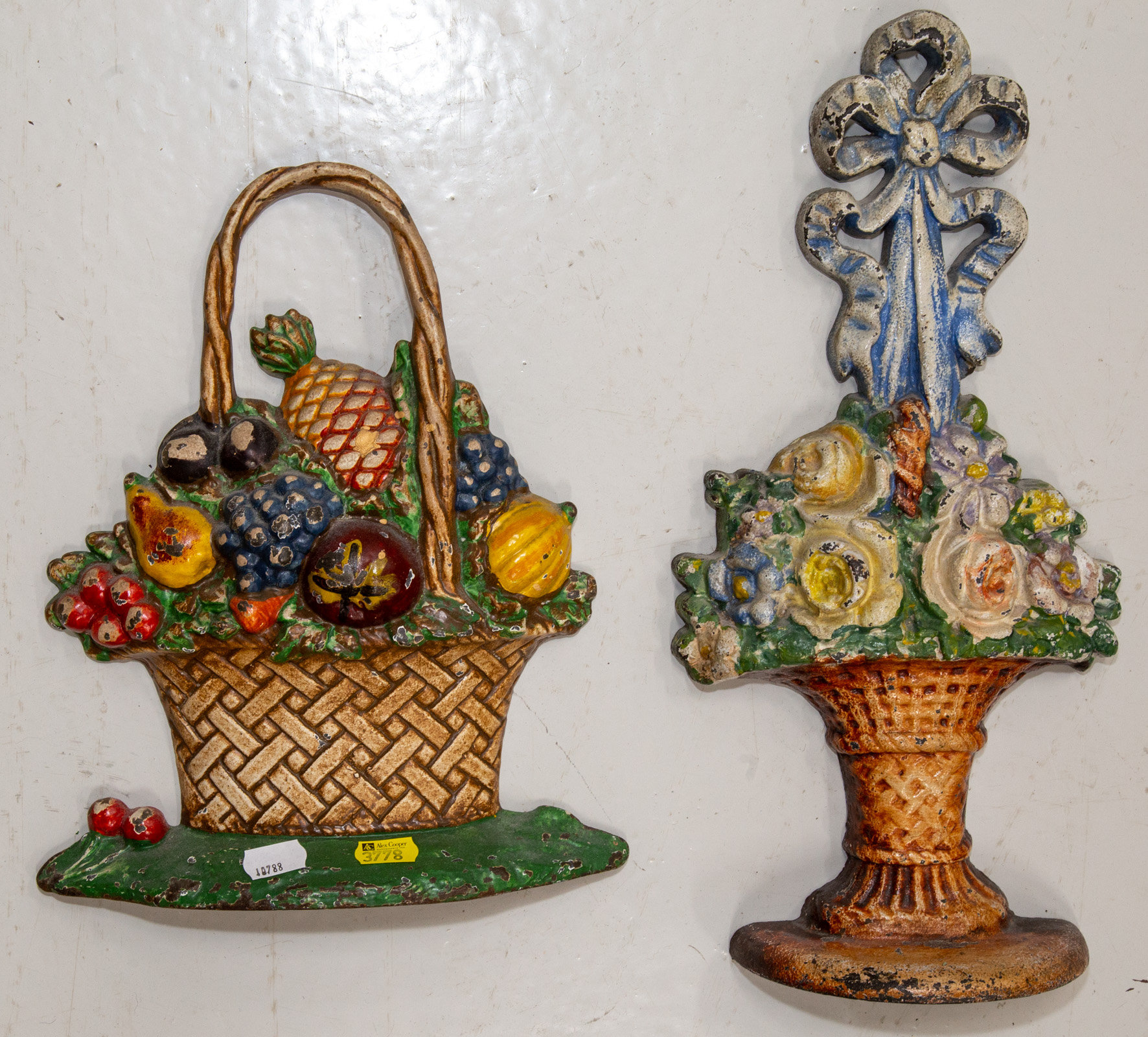 TWO LARGE PAINTED CAST IRON DOOR