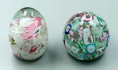 Two latticino paperweights: one egg