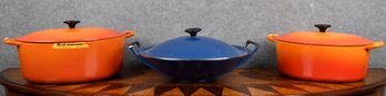Two Le Cresuset orange cast iron