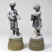TWO LEAD GARDEN FIGURES ON COM