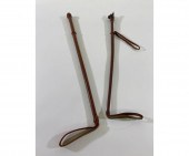 Two leather covered riding cro