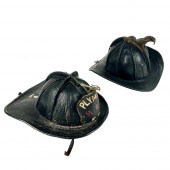 TWO LEATHER FIRE HELMETS 19TH