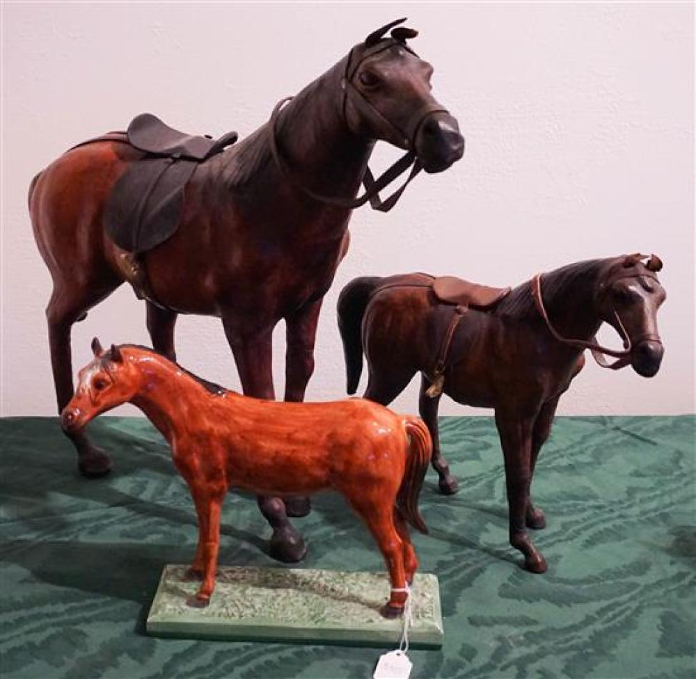 TWO LEATHER HORSES AND ONE