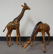 TWO LEATHER MOUNTED FIGURES OF