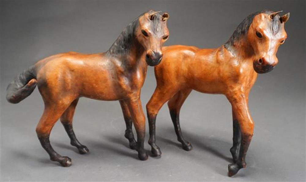 TWO LEATHER MOUNTED HORSES, HEIGHT: