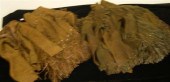 Two leather riding outfits con
