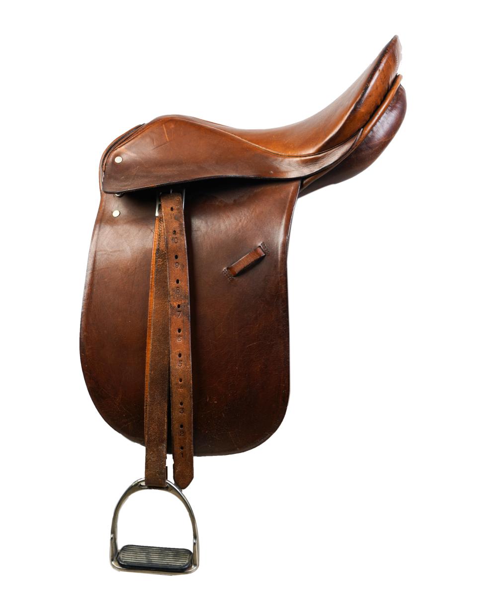 TWO LEATHER SADDLESwith included