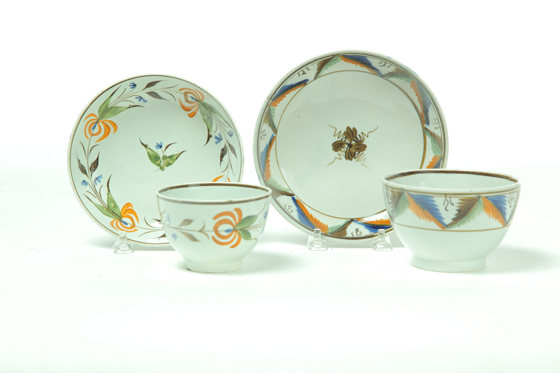 TWO LEEDS HANDLELESS CUPS AND